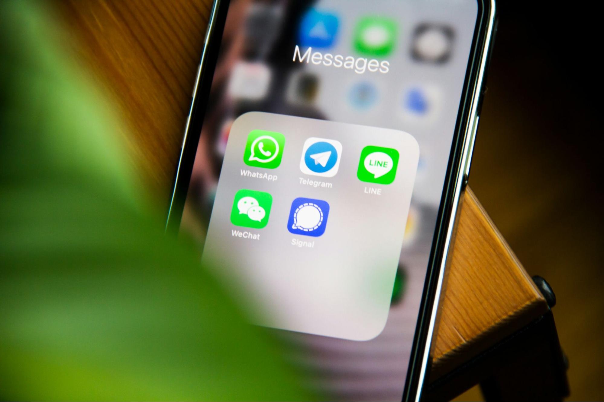Close-up of a mobile phone screen, representing multi-channel customer communication and business texting solutions.